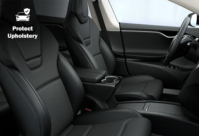 Tesla interior with black leather seats and central armrest, overlaid with text “Protect Upholstery” and an icon of a car with a shield.